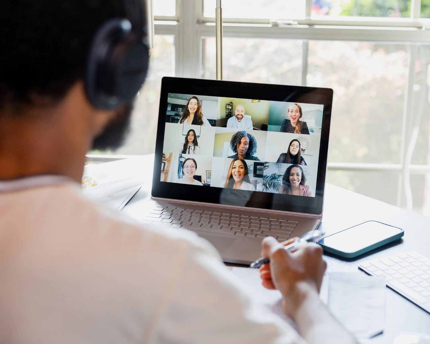 Photo editing workspace with an open portrait on a laptop